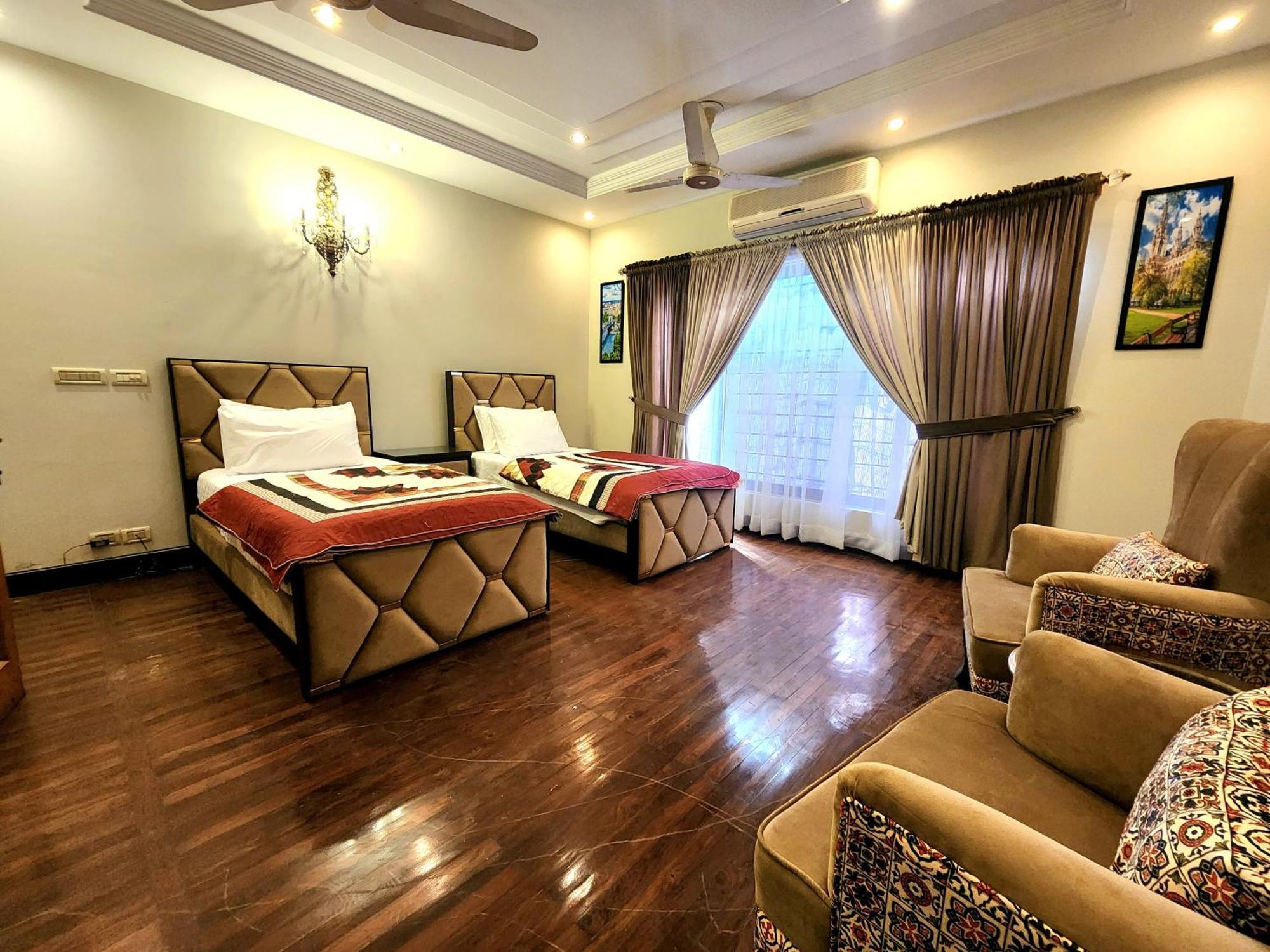The Millenial Apartments & Suites Bahria Town Rawalpindi Værelse billede