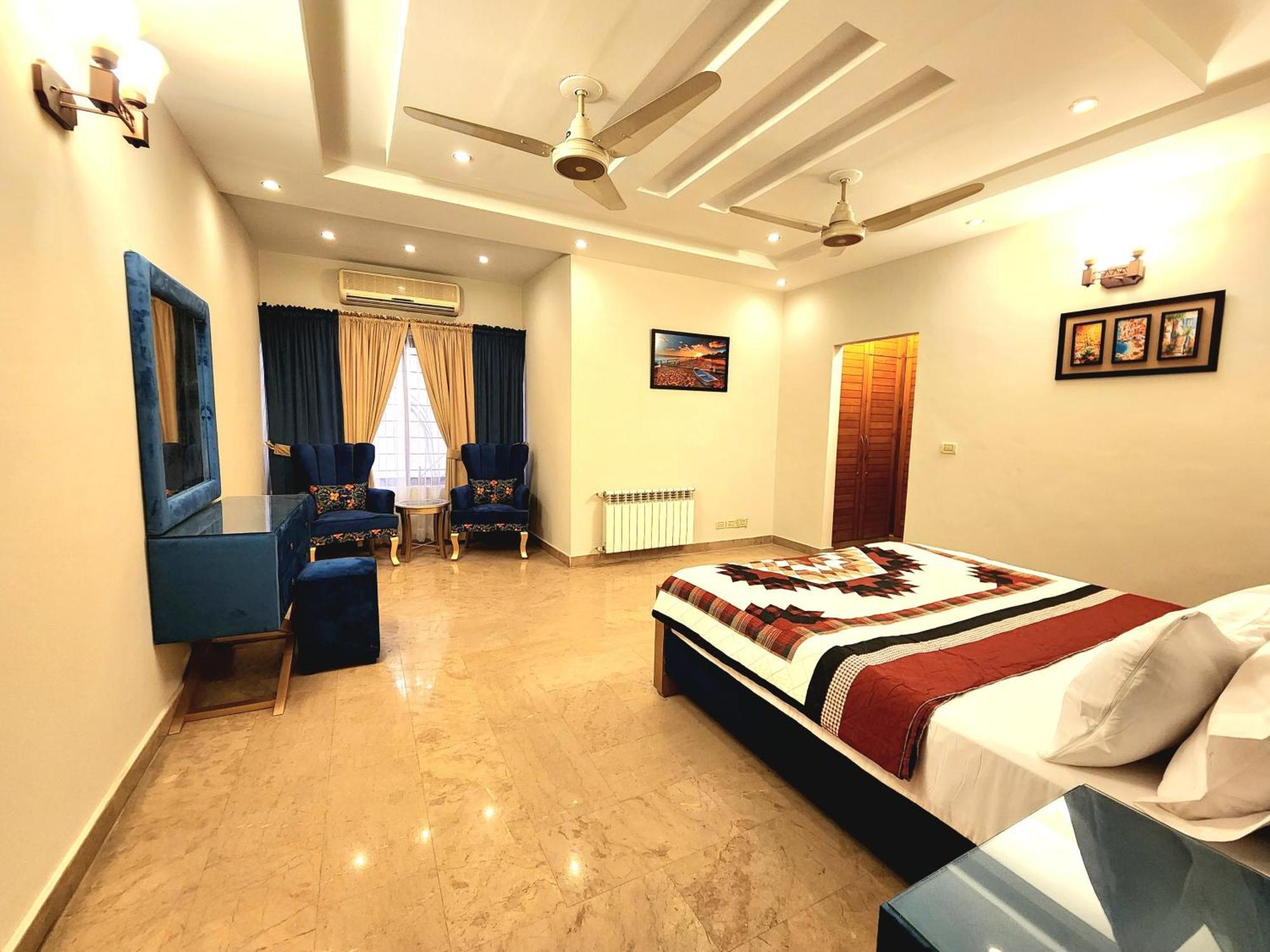 The Millenial Apartments & Suites Bahria Town Rawalpindi Værelse billede