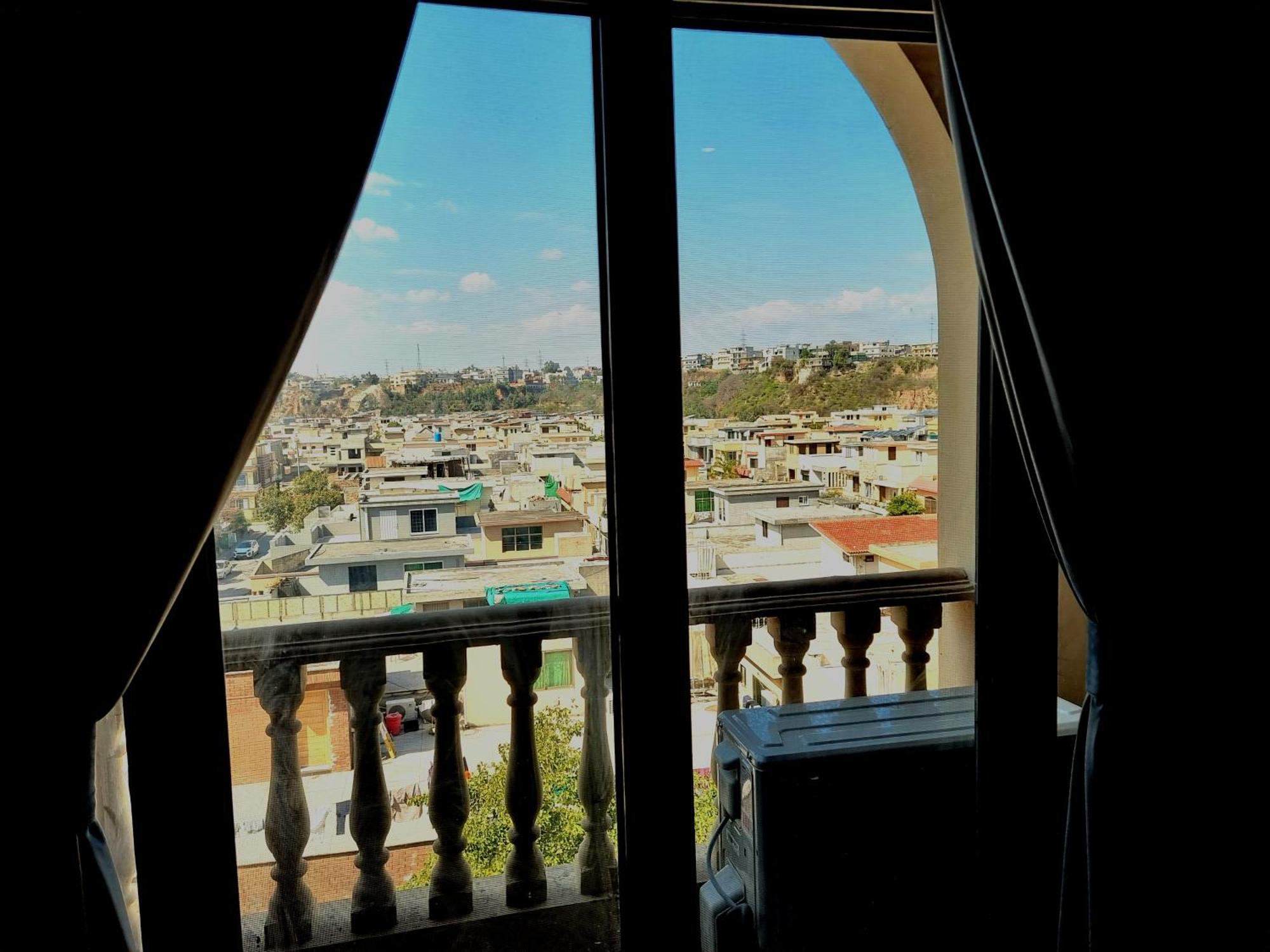 The Millenial Apartments & Suites Bahria Town Rawalpindi Værelse billede