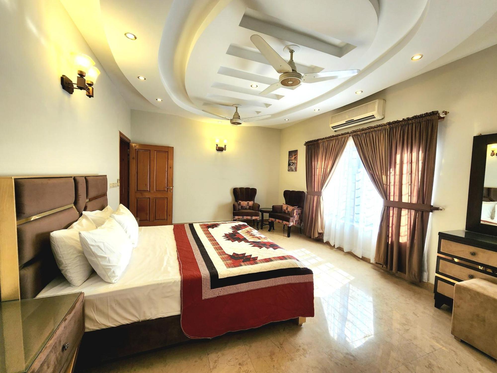 The Millenial Apartments & Suites Bahria Town Rawalpindi Værelse billede
