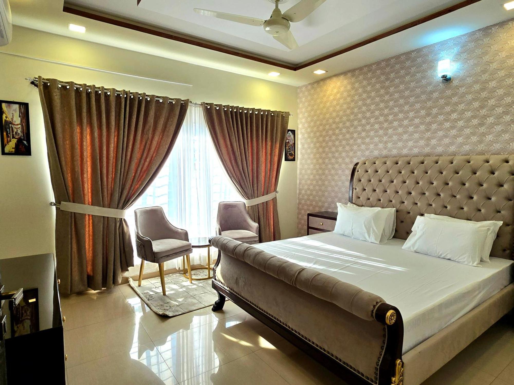 The Millenial Apartments & Suites Bahria Town Rawalpindi Værelse billede