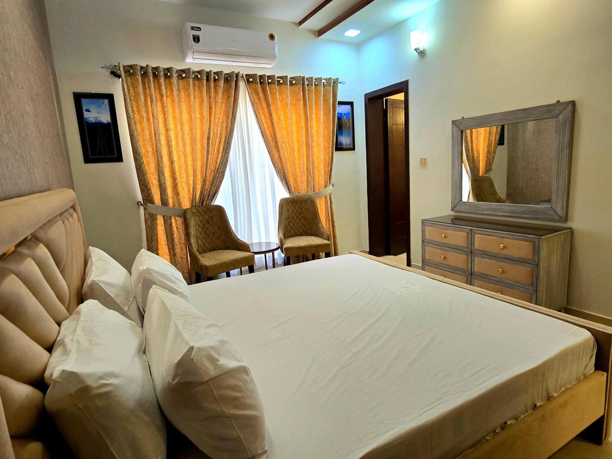 The Millenial Apartments & Suites Bahria Town Rawalpindi Værelse billede